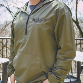 A man wearing a green Jacket from Schells 