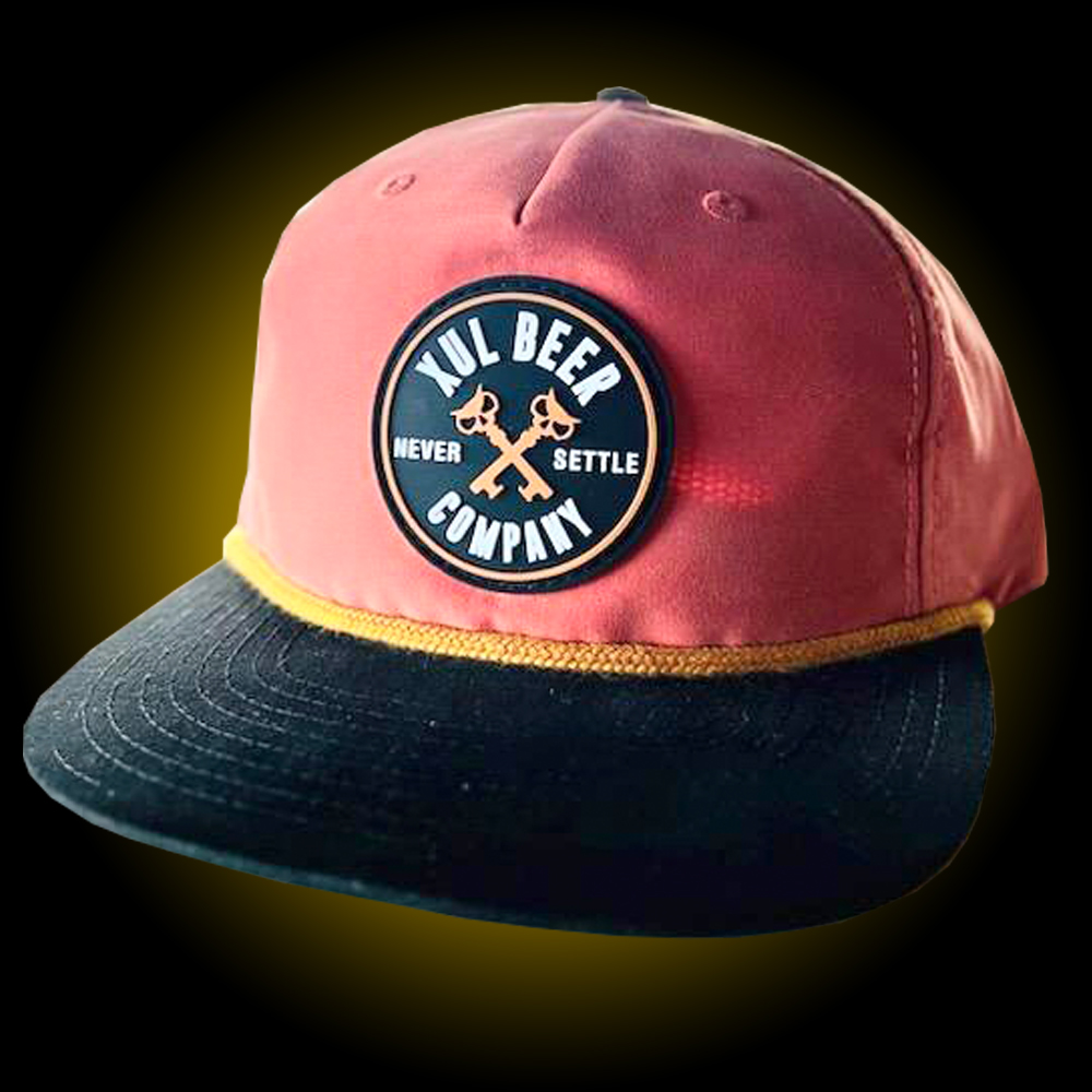 salmon grandpa hat with gold rope and black bill