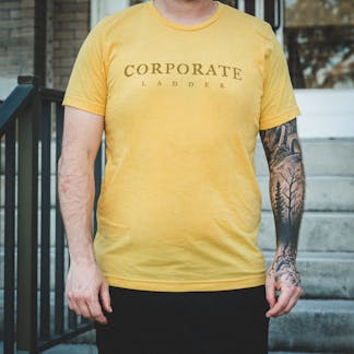 Yellow Unisex Shirt with Corporate Ladder Wordmark on front and circle ladder logo on back.
