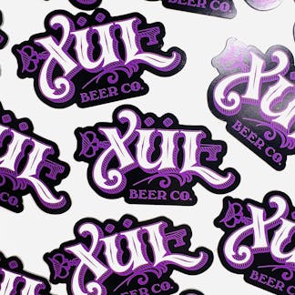 Purple and black Xul magnet.