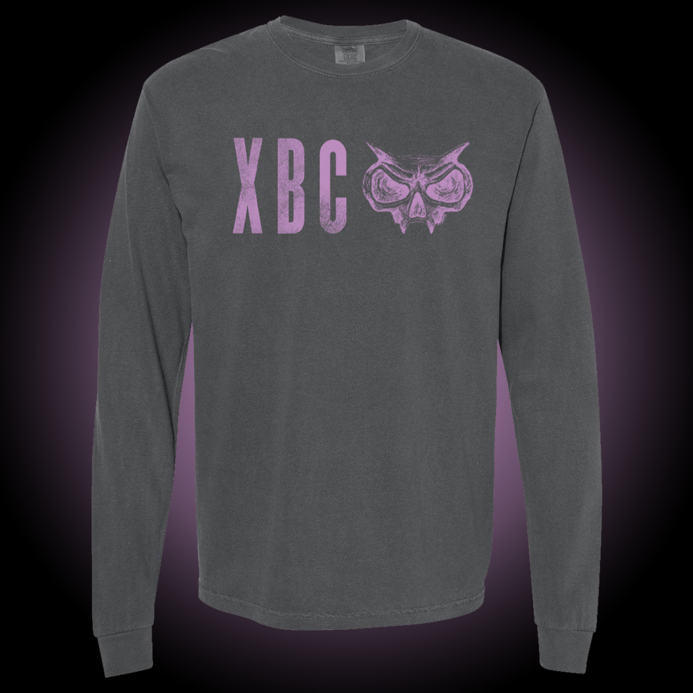 Comfort Colors long sleeve shirt, pepper color. Purple XBC logo on front.