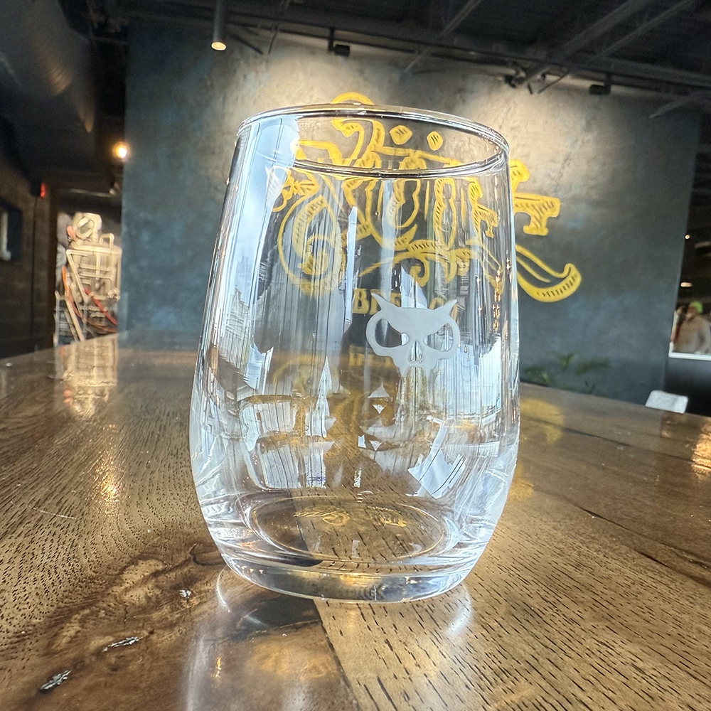 6.25oz taster glass with our fanghead in white.