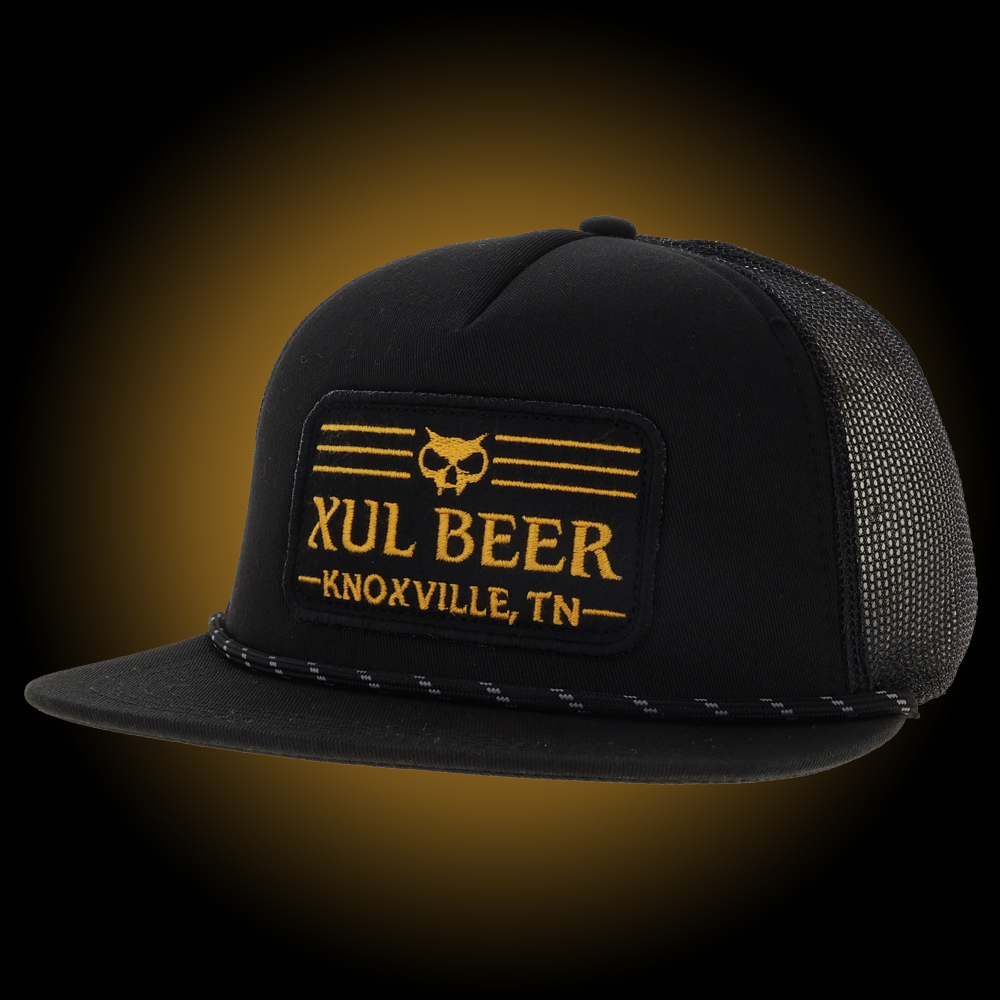 Xul Beer Company black and gold trucker.