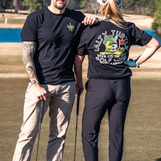 Man and Women posing with Golf Crew Shirt Black
