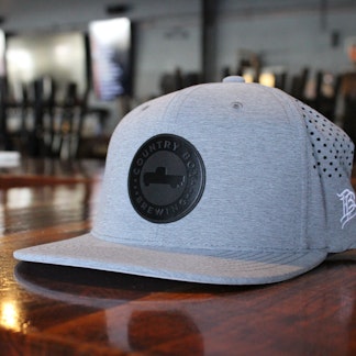 Grey Branded bills hat with black country boy logo in the front center as a circle.