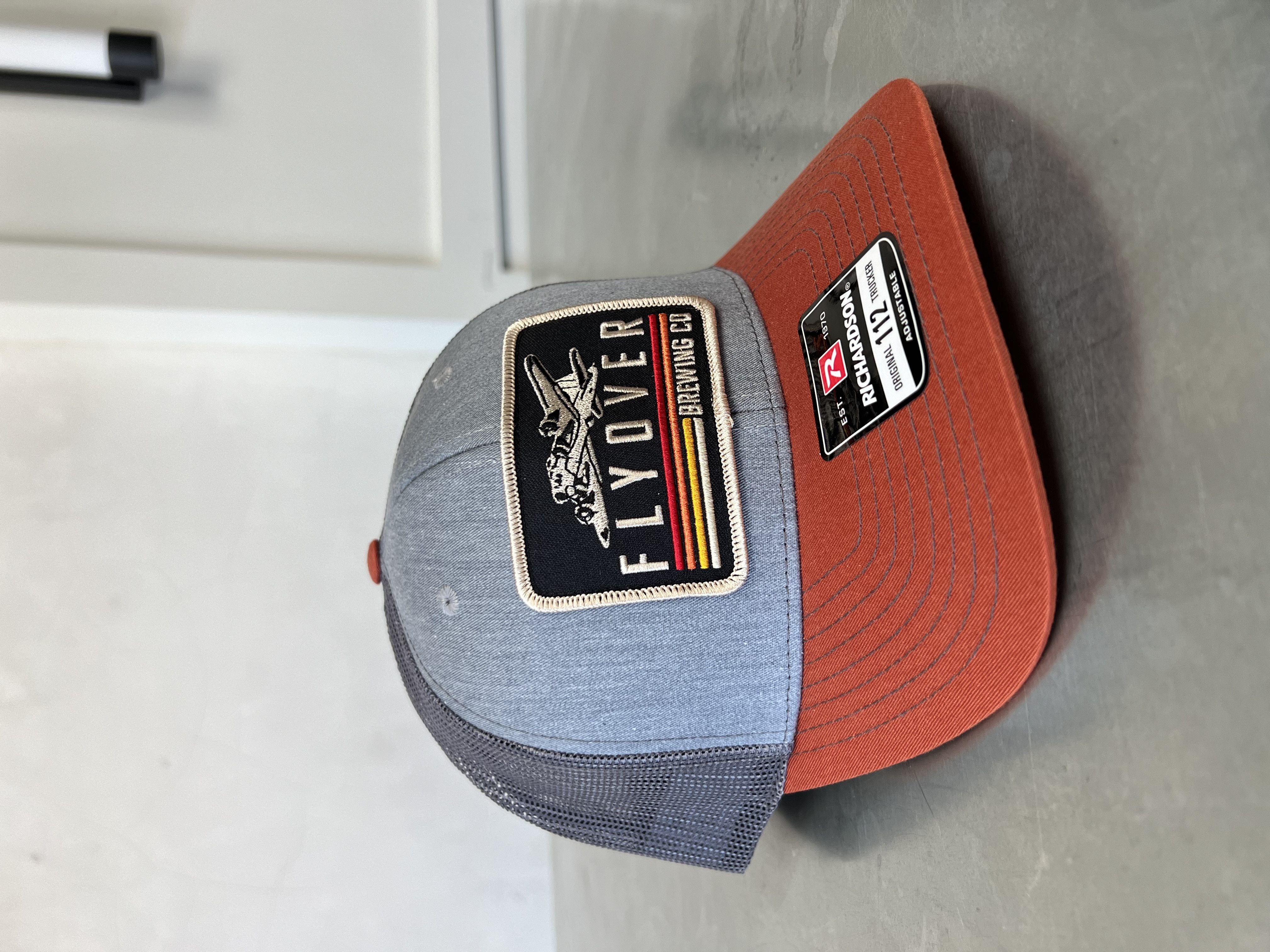 orange and grey Richardson 112 trucker