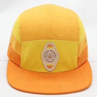 Orange flat brim hat with keychain logo