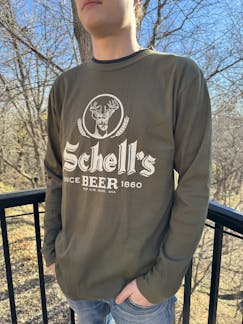 Olive color crew with Schell logo on front.