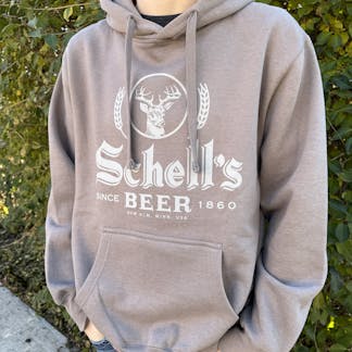 Teak color, heavy weight hood with the Schells logo on front.