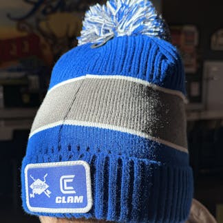 Blue and grey stocking cap with a Grain Belt patch on one side.