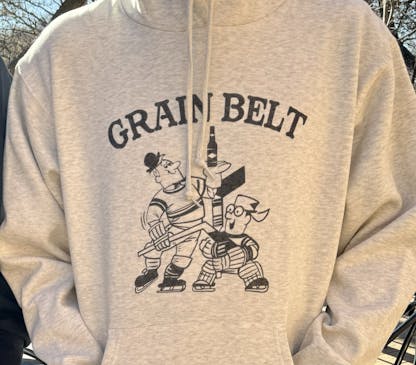 Oatmeal colored hood with Stanley and Albert on front.
