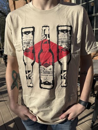 Tan T-shirt with three Grain Belt bottle logos on front.