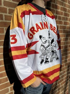 White, gold and red Grain Belt hockey jersey