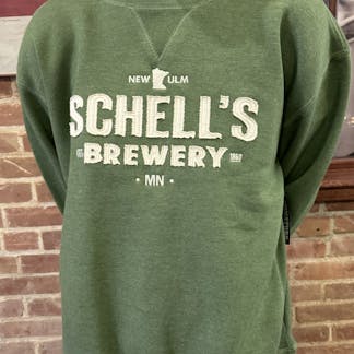 Green crew sweatshirt with white raised letters on front that say Schell's.