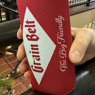 Red can coozie with Grain Belt logo on both sides.