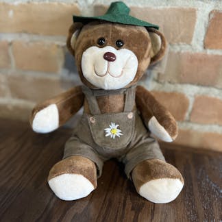 Bear stuffed animal wearing lederhosen.