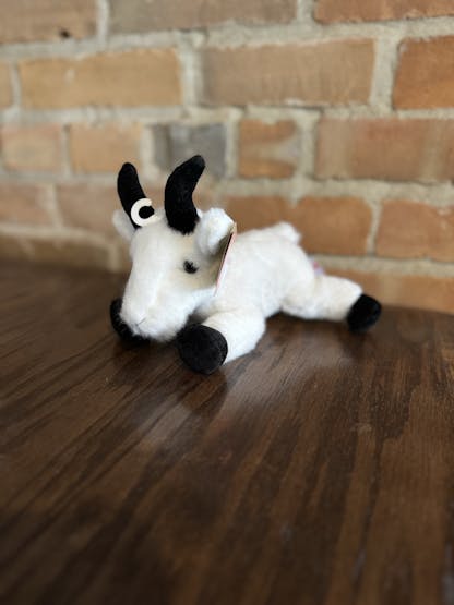 Goat stuffed animal.