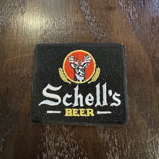 Schell small black square patch.