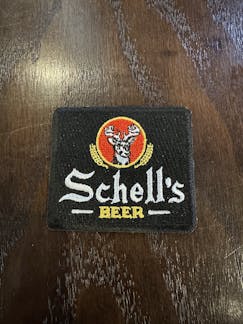 Schell small black square patch.