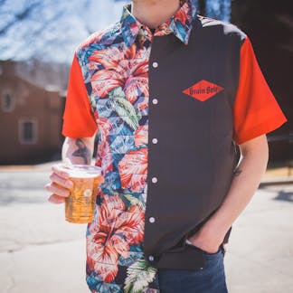 Black and red Hawaiian style shirt with Grain Belt logo on left lapel.