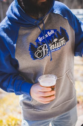 Grey sweatshirt with blue sleeves and the Grain Belt Premium Light logo on chest.