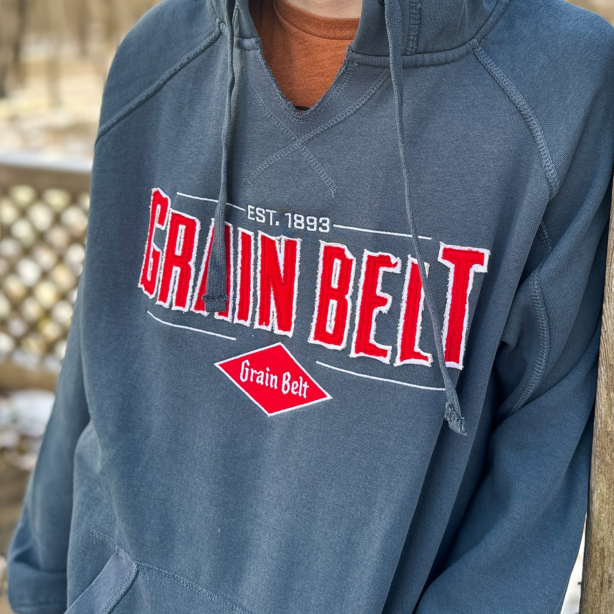 Navy hooded sweatshirt with Grain Belt in red on the front.