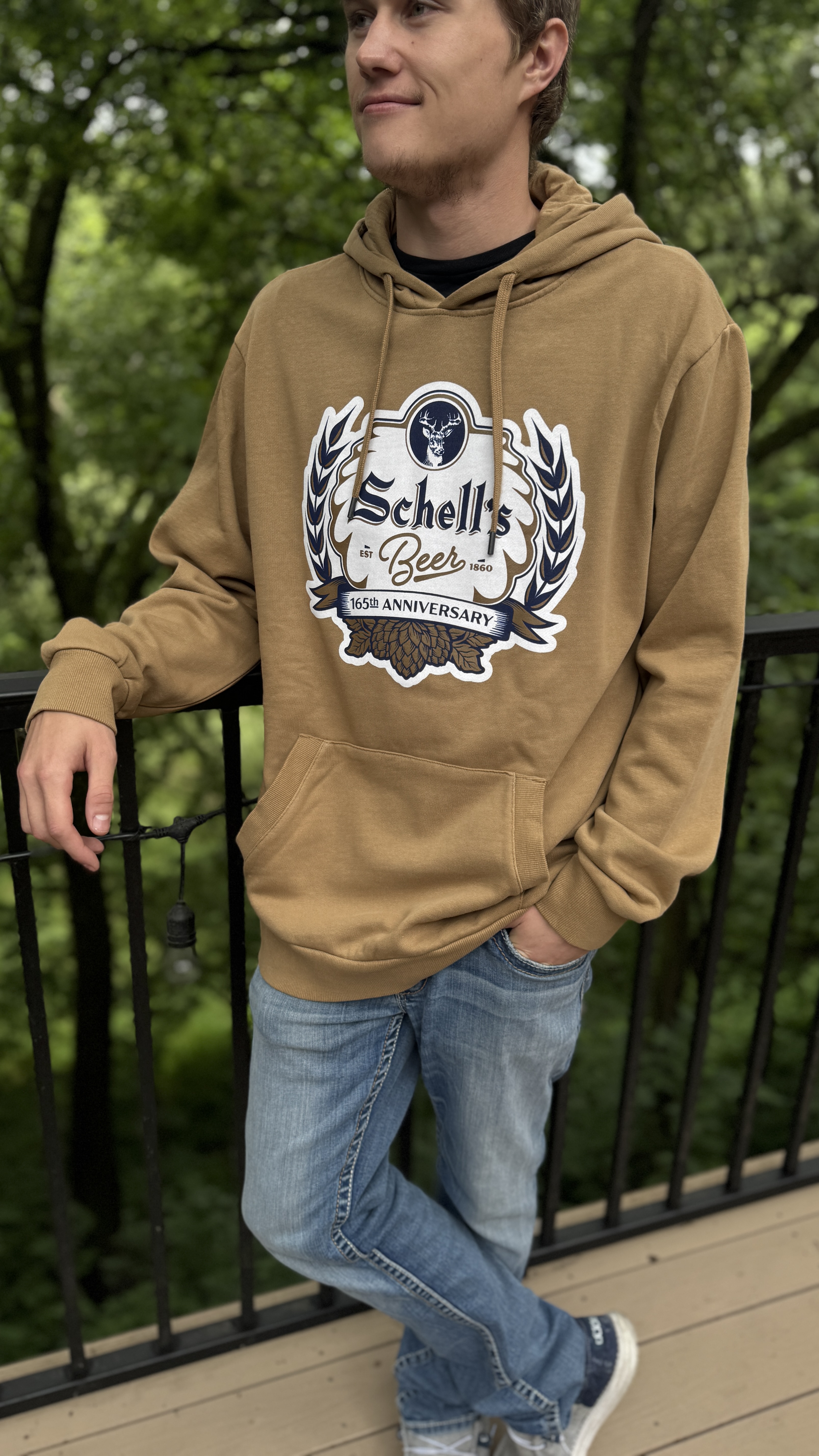 Brown colored hooded sweatshirt with Schell 165th anniversary logo on the front.