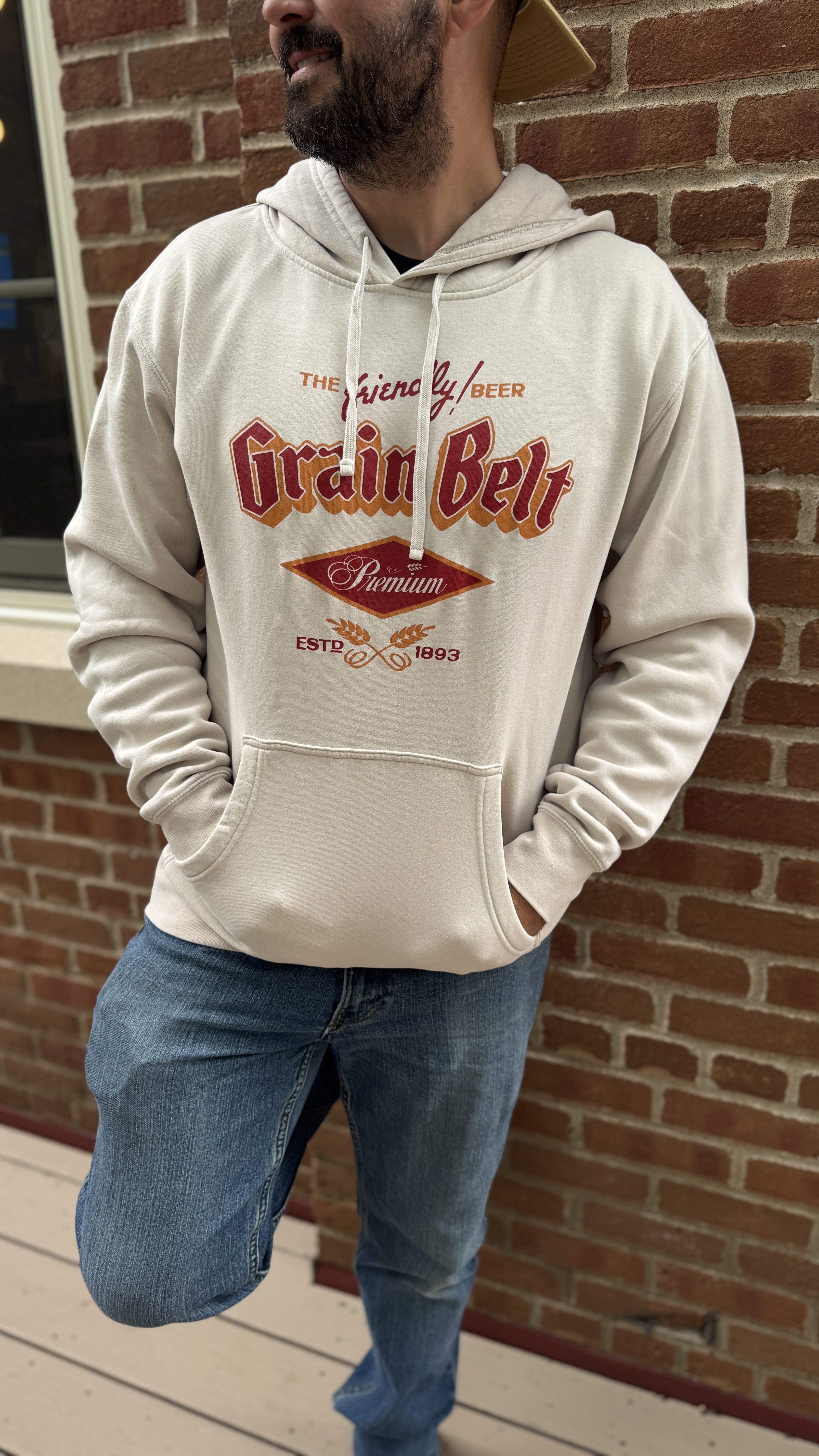 Ivory colored hooded sweatshirt with Grain Belt logo on the front.