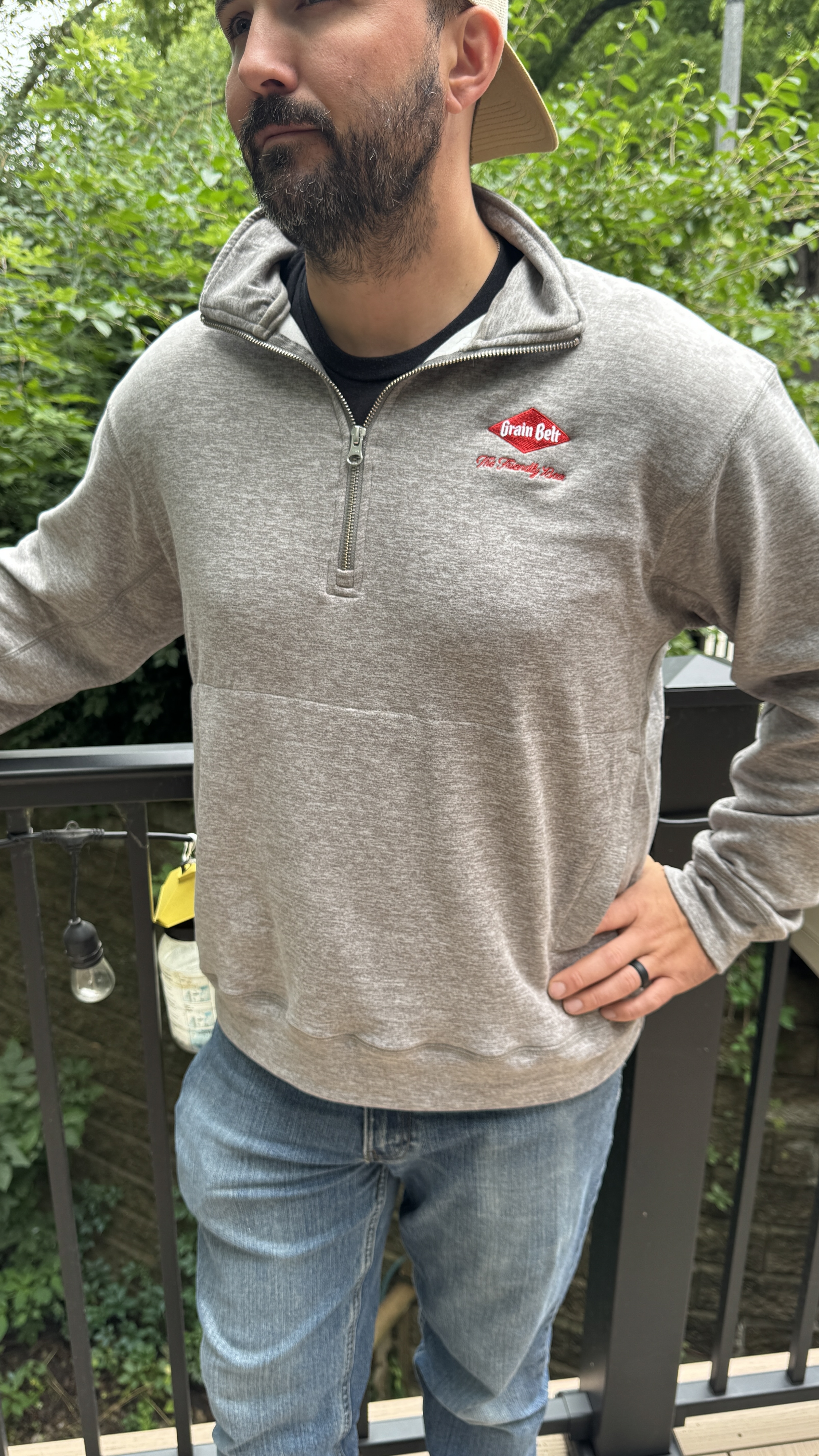 Grey quarter zip sweatshirt with Grain Belt logo embroidered on left lapel.