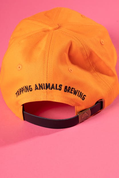 Yellow tripping animals brewing hat