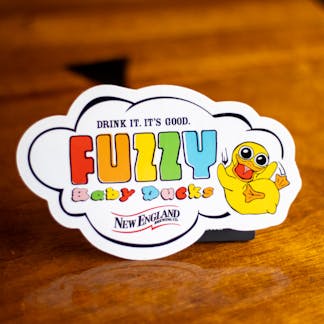 Close-up photo of Fuzzy Baby Ducks logo sticker