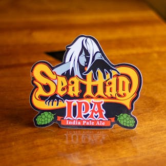 close up image of Sea Hag beer logo sticker