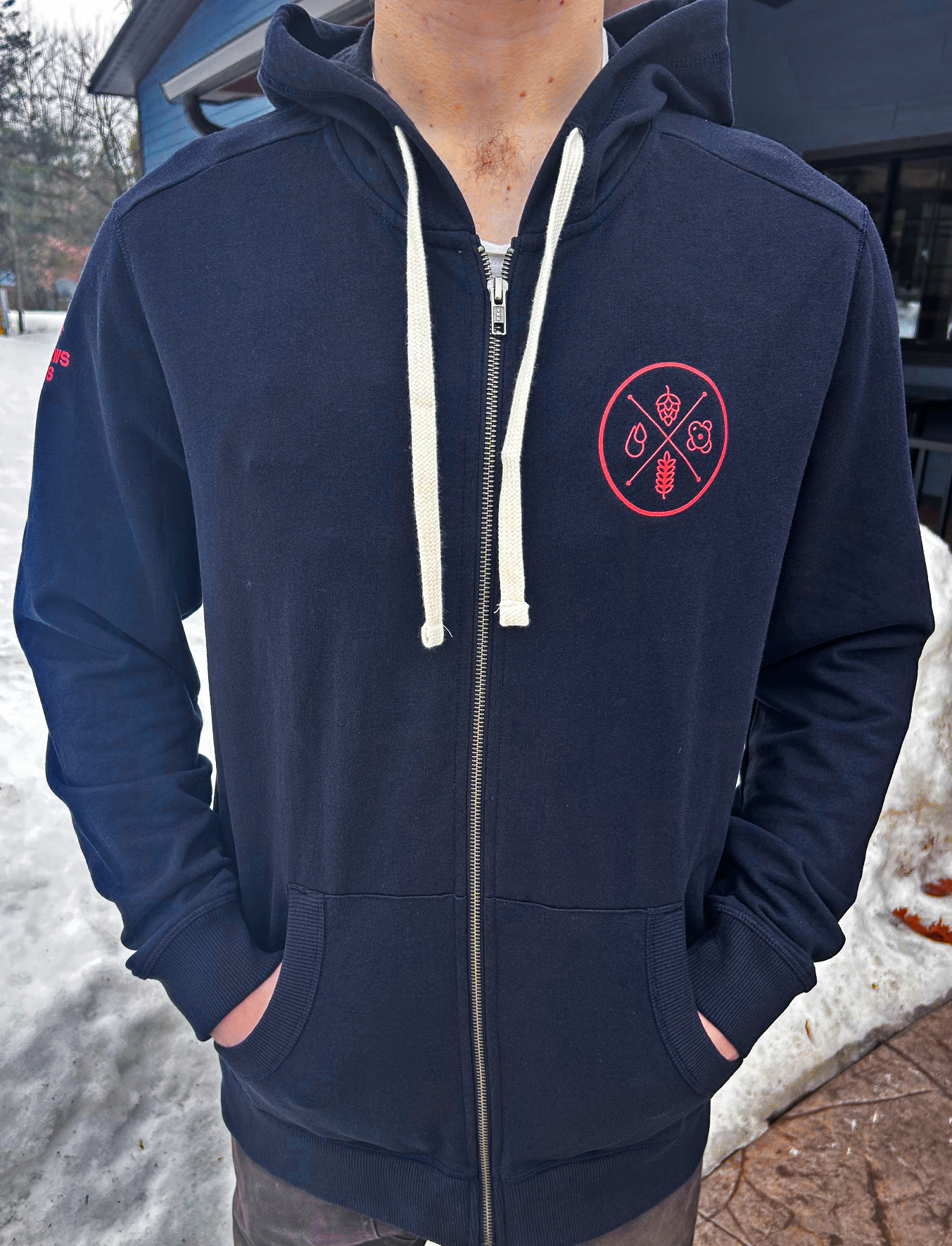 front of full zip hoodie with circle icon logo in red