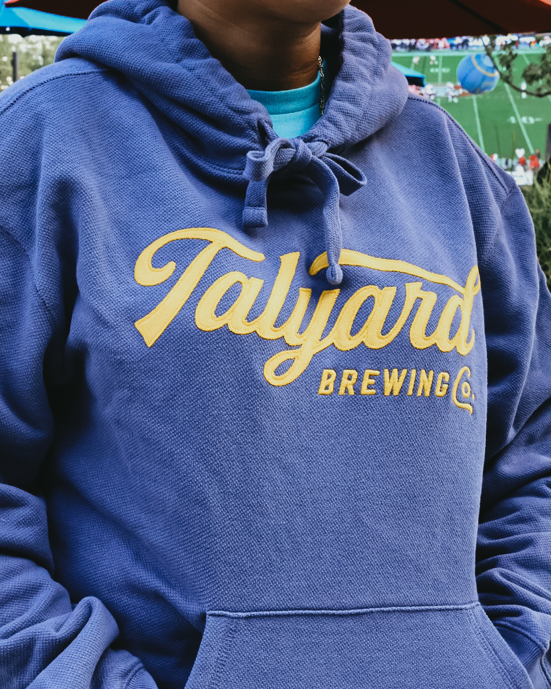 Purple waffle knit hoodie, with yellow Talyard script