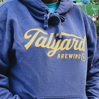 Purple waffle knit hoodie, with yellow Talyard script