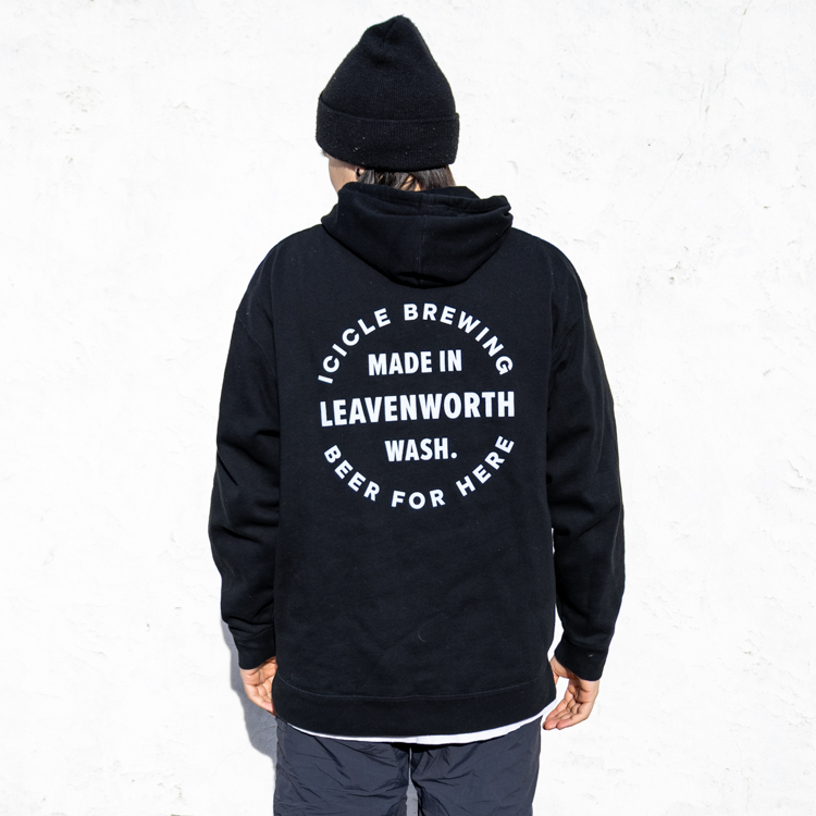 black hoodie with mountain logo in white