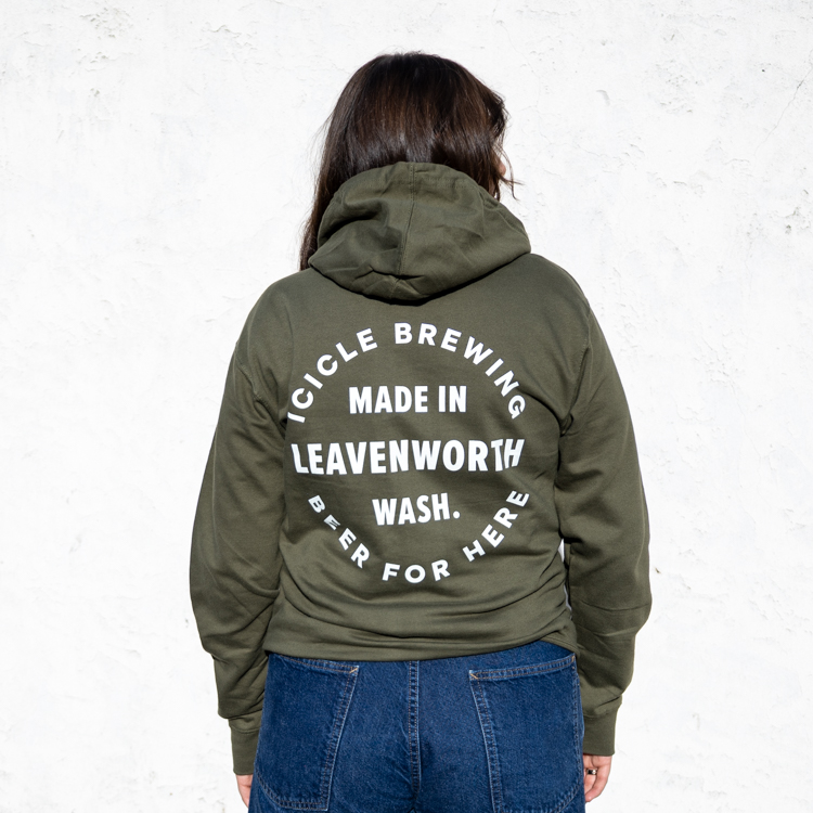 olive green hoodie with mountain logo in white