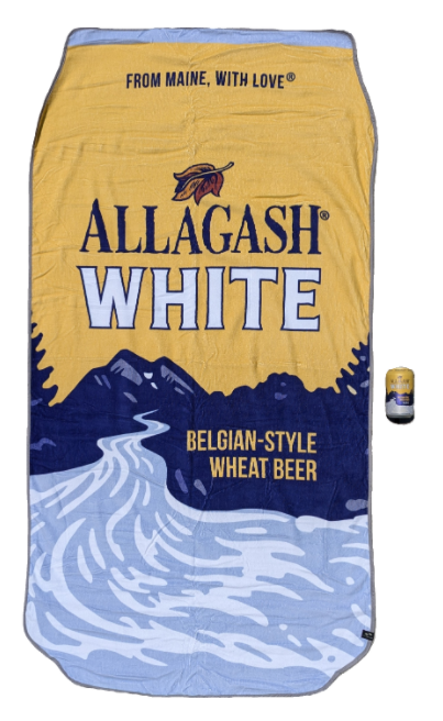 a beach towel shaped like a beer can next to a beercan