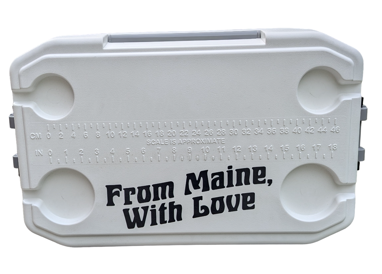 the top of a white cooler with 4 cup holders, a ruler and the text From Maine, With Love