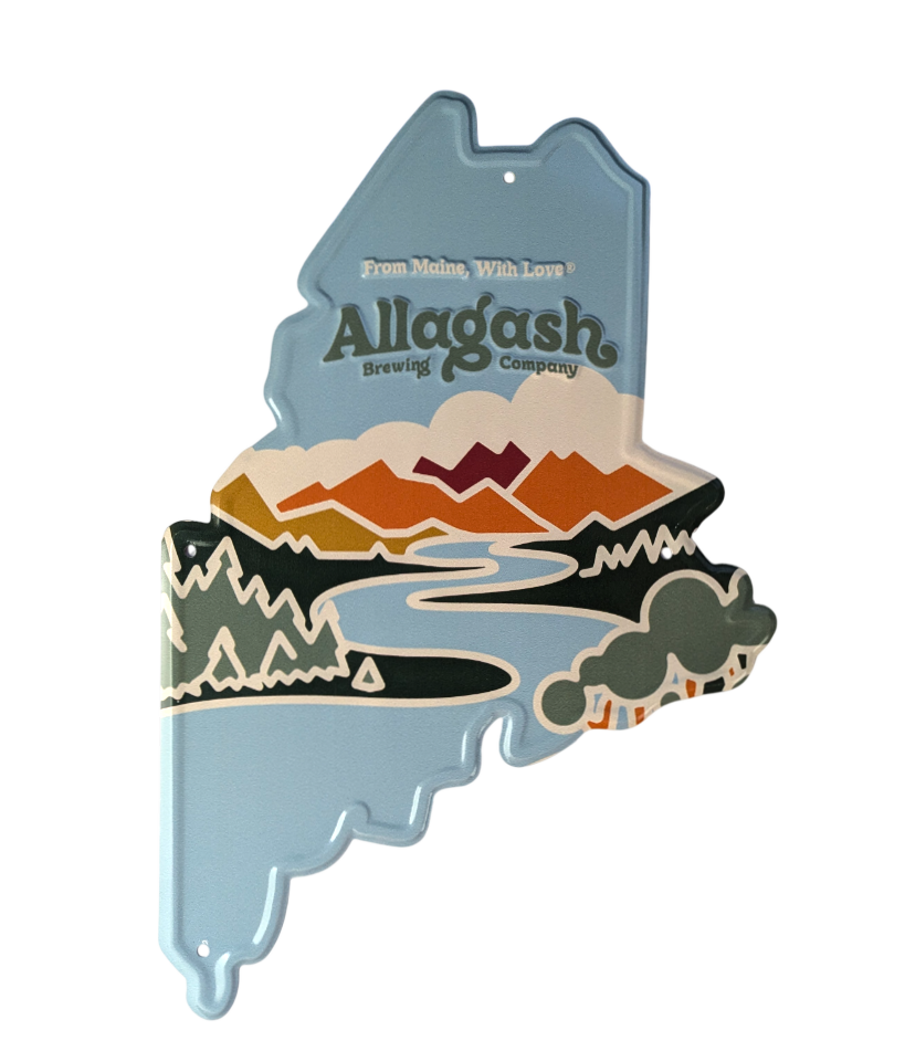 a maine shaped tin tacker sign with a colorful river and mountain scene. The text reads From Maine, With Love Allagash
