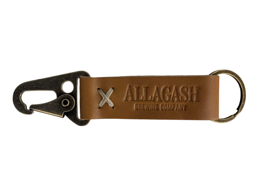 a leather and metal keychain with beltloop clip. The text reads Allagash Brewing Company