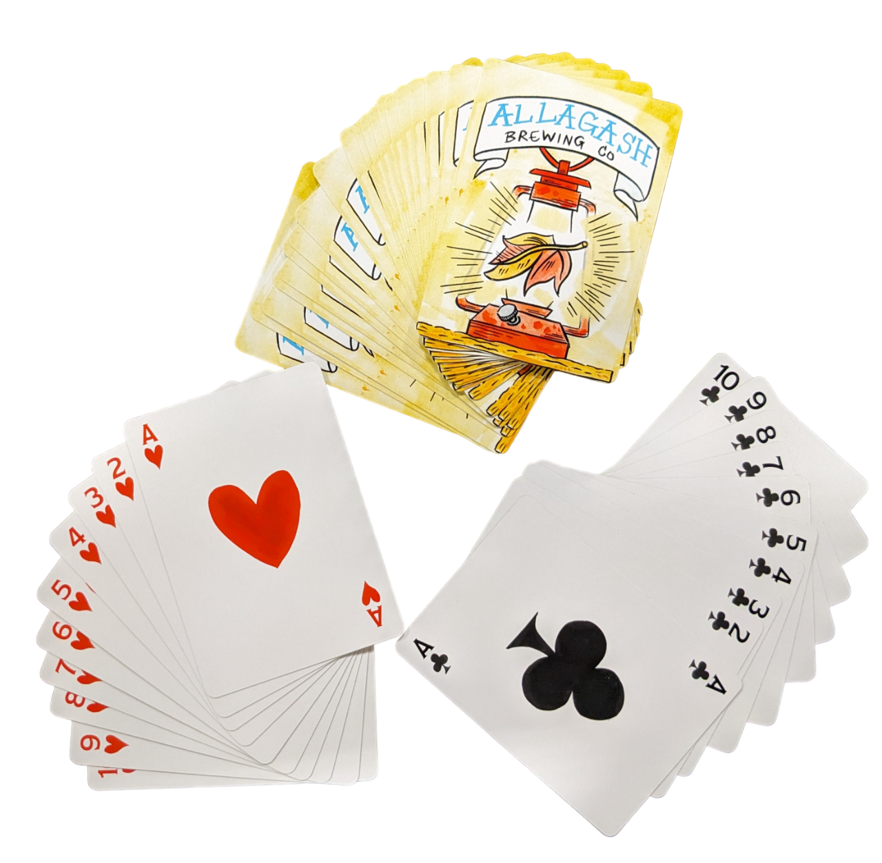 a playing card box with playing cards fanned out around it.