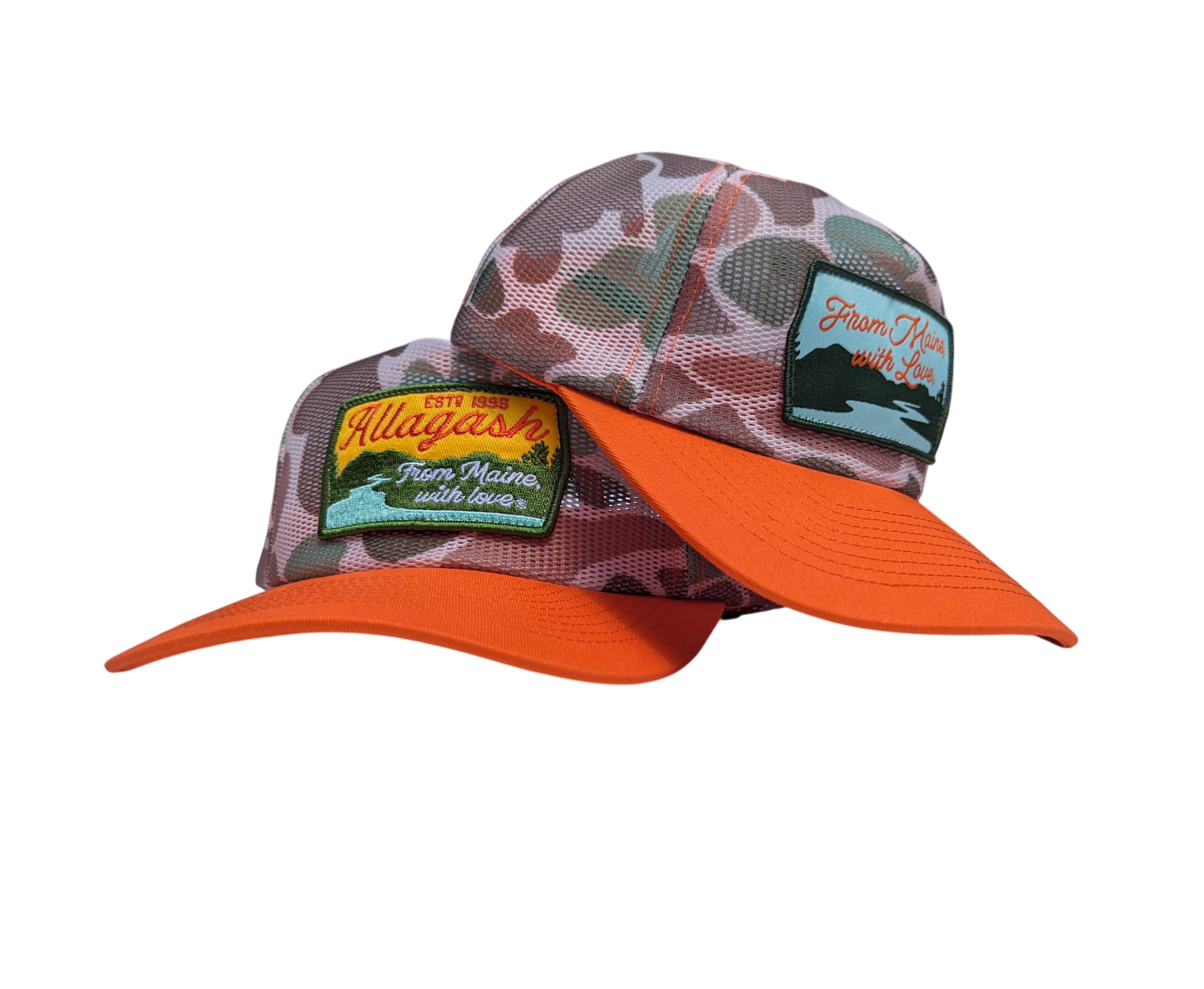 two camo hats stacked up