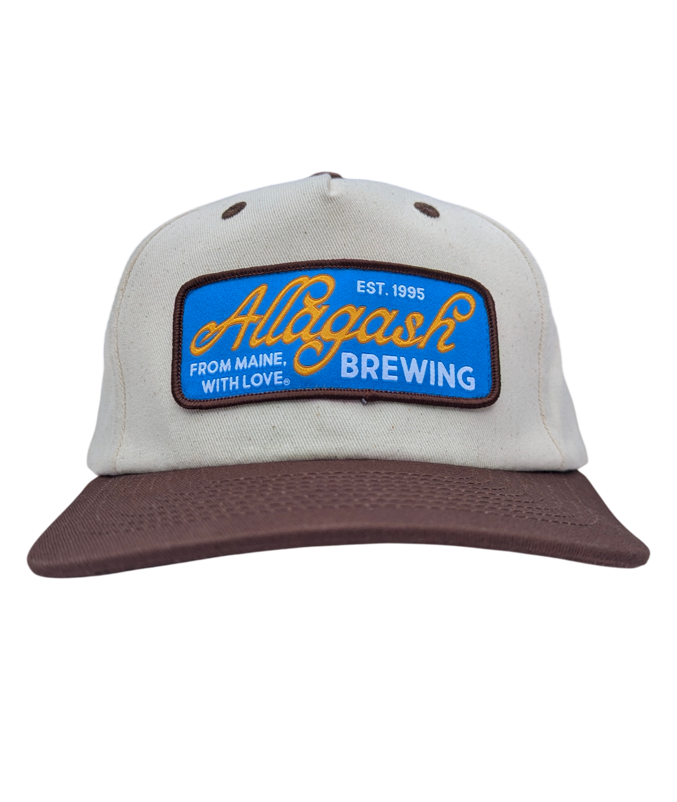 A white hat with brown brim and blue patch. The patch reads Allagash Brewery
