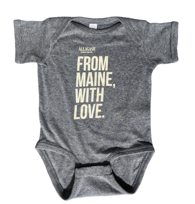 a baby onesie with the text From Maine With Love