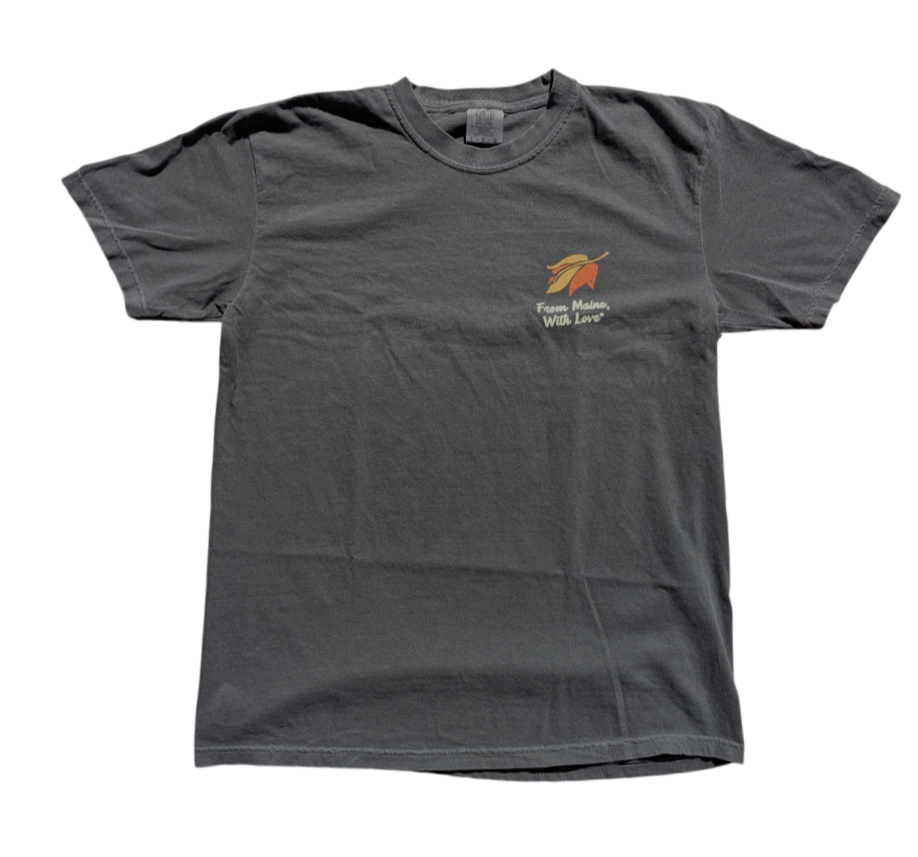 a dark pepper color tee with a retro leaf and the text From Maine With Love