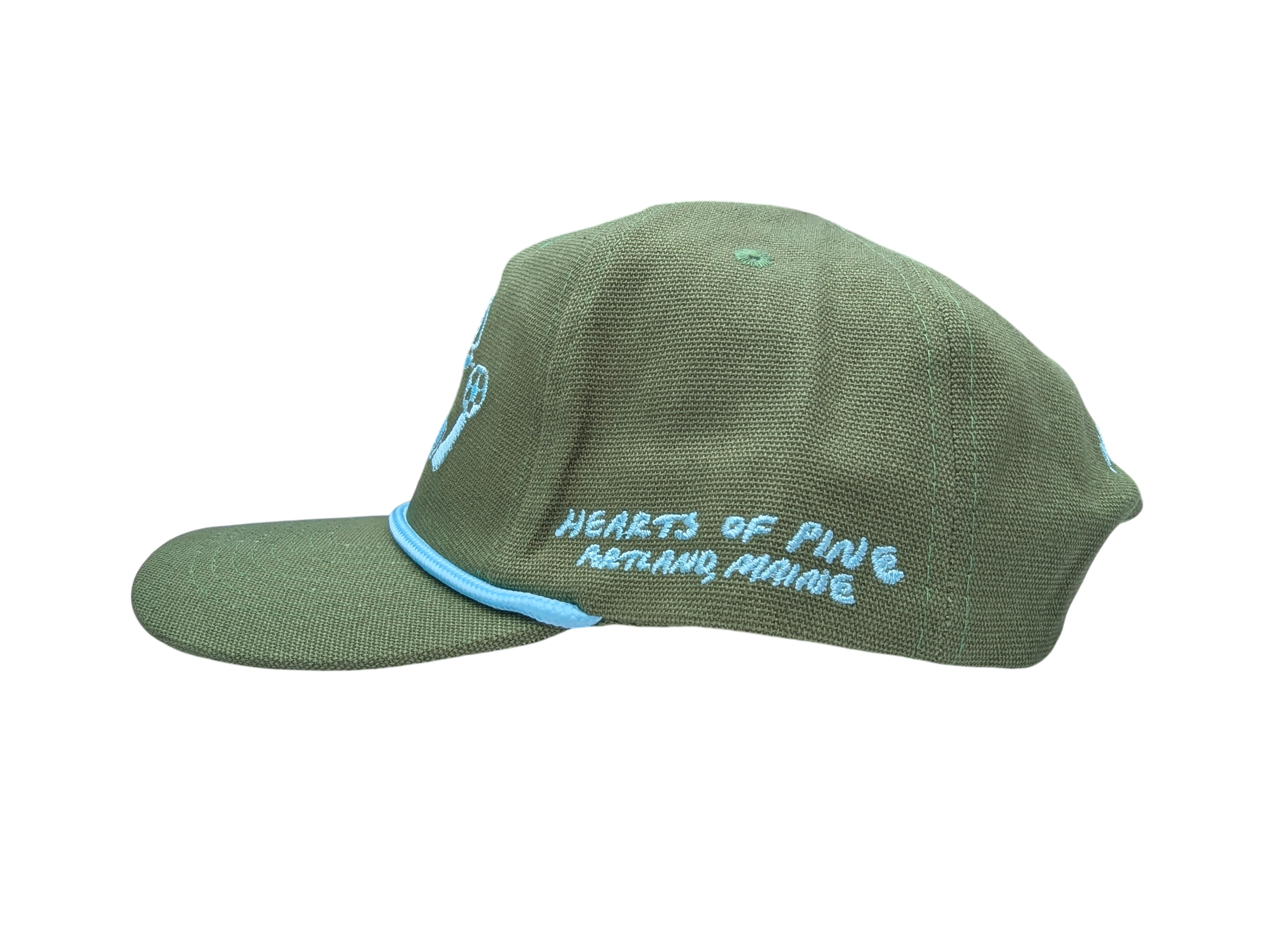 The side of a canvas hat with the text Hearts of Pine Portland, Maine