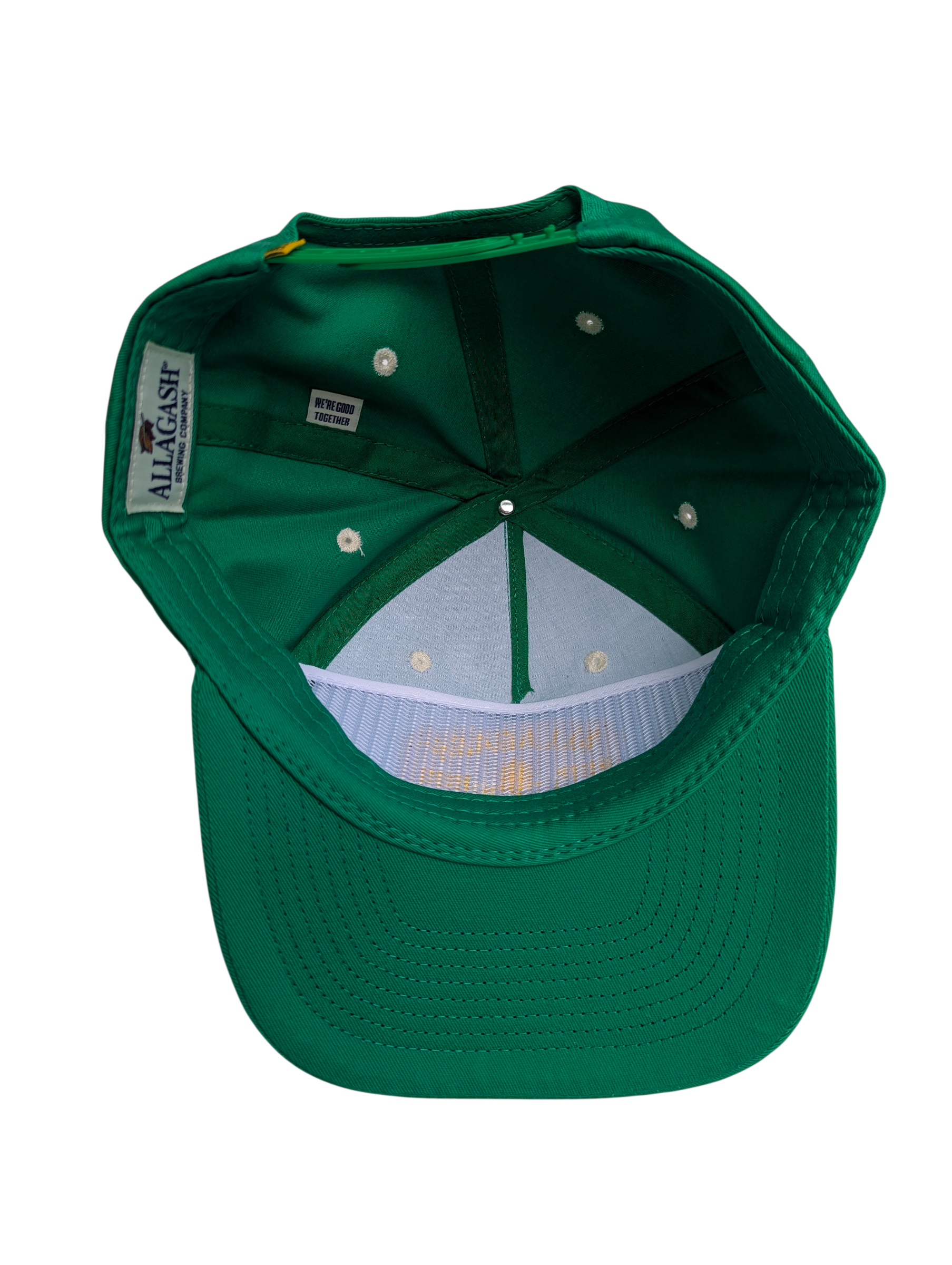 The underside of a green hat
