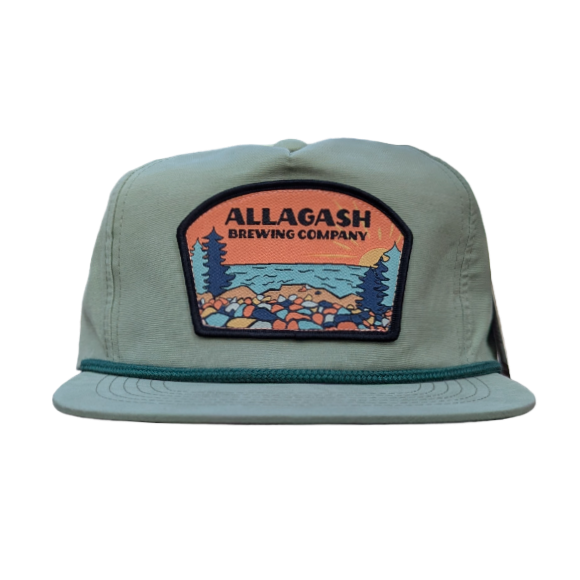 an olive green hat with a colorful front patch and the text Allagash Brewing Company