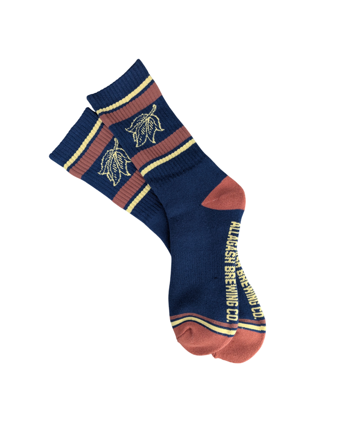A pair of red and blue socks featuring a yellow leaf and the text Allagash Brewing Co.